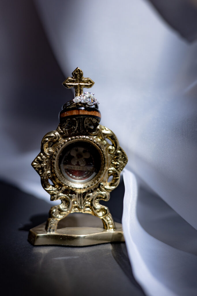 St. Therese of Lisieux relic with wedding rings detail shot.