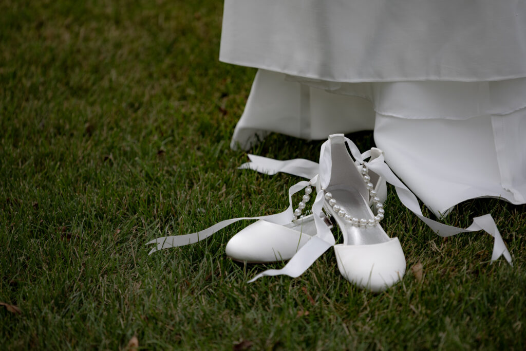 Ribbons on beautiful wedding flats make for a beautiful detail for wedding day details.