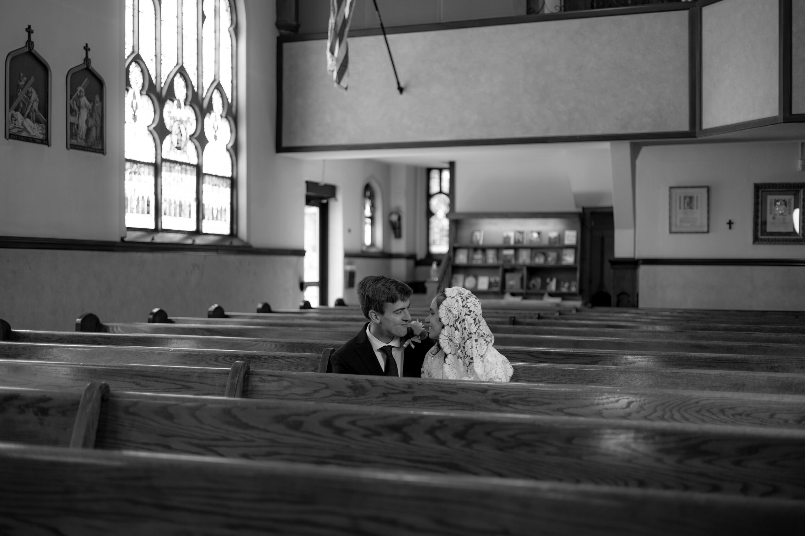 Catholic Bride and Groom share an intimate moment after their wedding