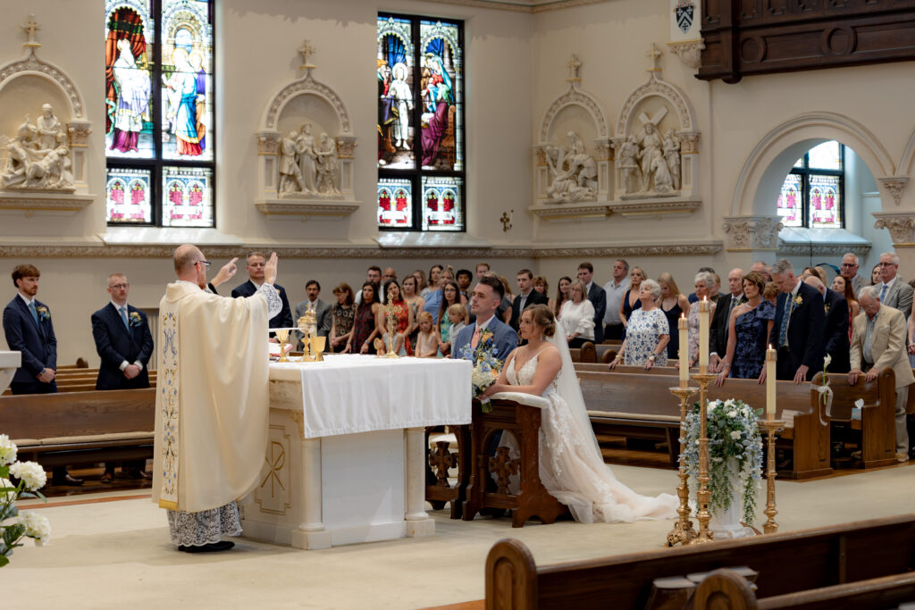 Bride and Groom celebrate their Novus Ordo Wedding Mass at the beautiful St. Mary's Catholic Church in Tiffin, OH